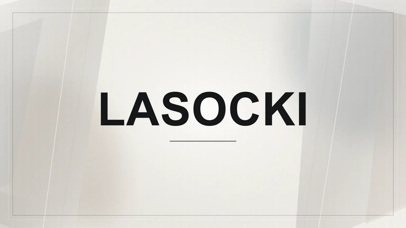 Nápis Lasocki na světlém abstraktním geometrickém pozadí